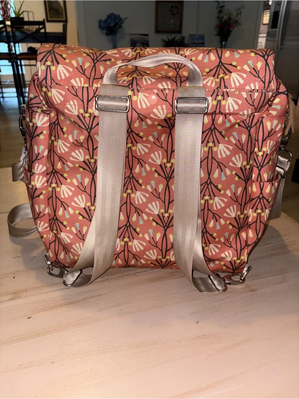 Petunia Pickle Bottom Coral Floral Baby Bag with Champagne Strap